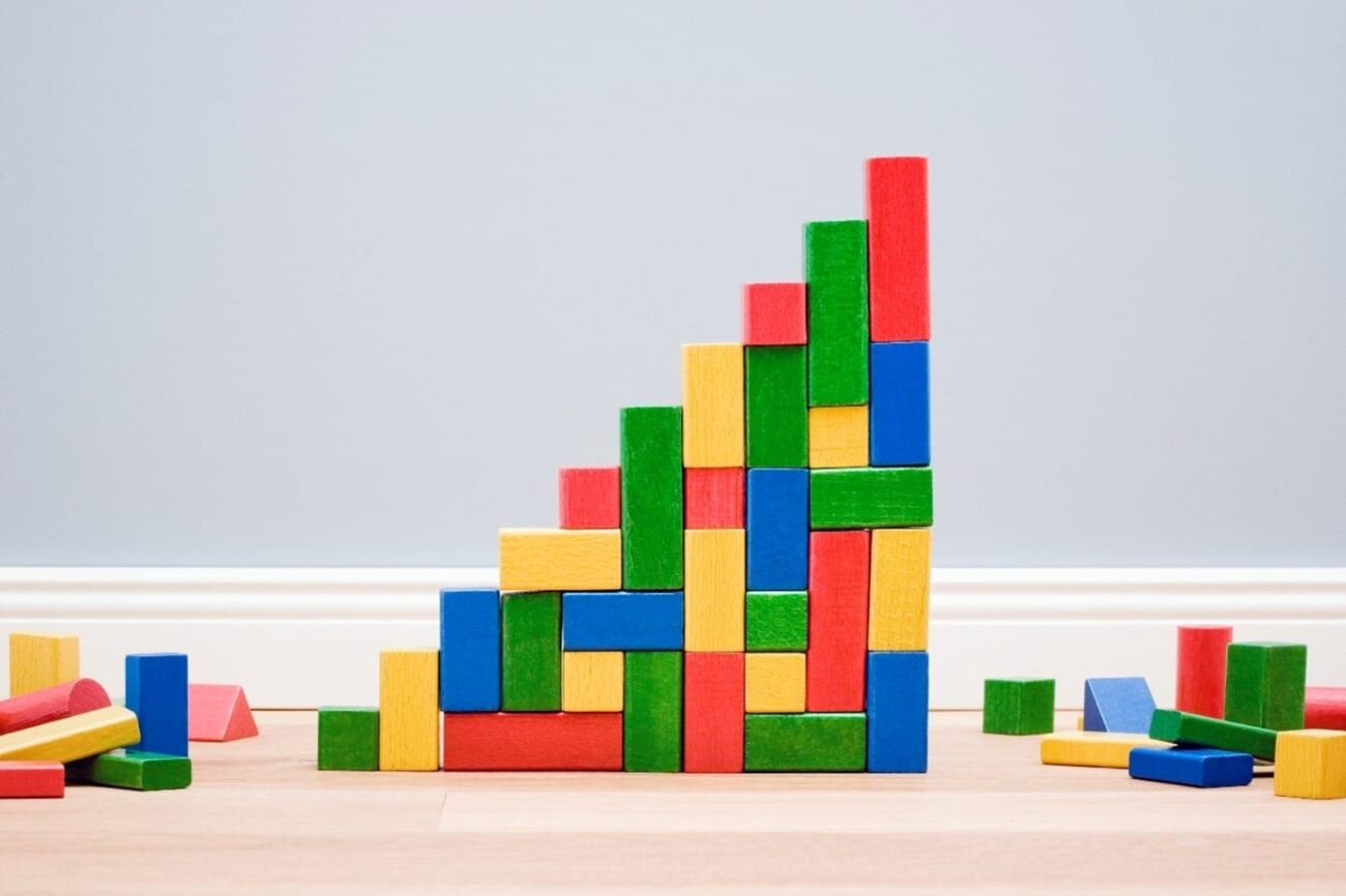 Image shows colourful building blocks.